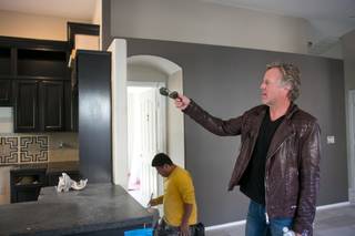 Scott Yancey, from A&E’s “Flipping Vegas,” does a walk-through to see the progress of one of their remodeling projects on Tuesday Nov. 26, 2013.